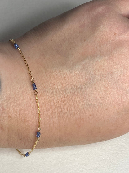 14k gold paperclip chain bracelet with untreated violet-blue Burmese sapphire beads.