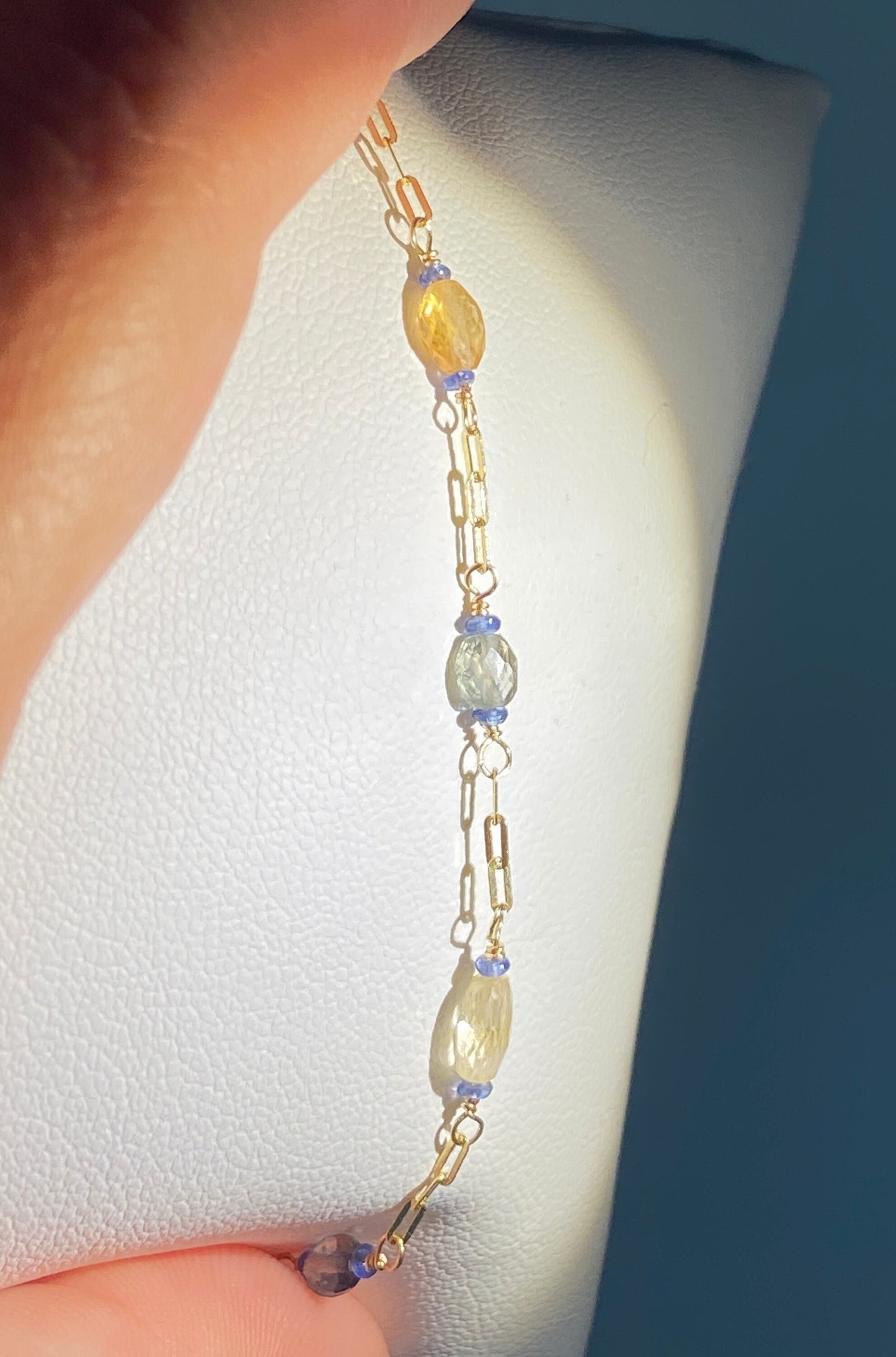 14k gold chain necklace with multi-colored sapphires.