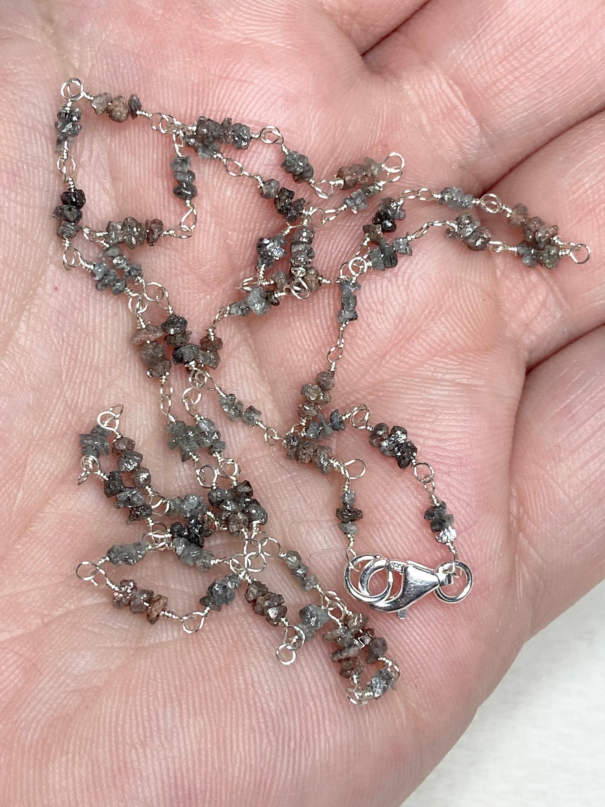 Rough natural silver and brown diamond beaded necklace in sterling silver.