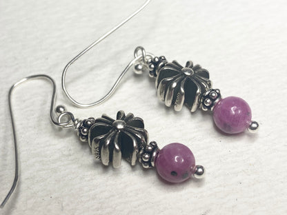 Sterling silver dangle earrings with pink sapphire beads and cross charms.
