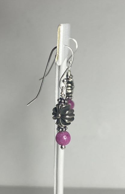 Sterling silver dangle earrings with pink sapphire beads and a cross charm.