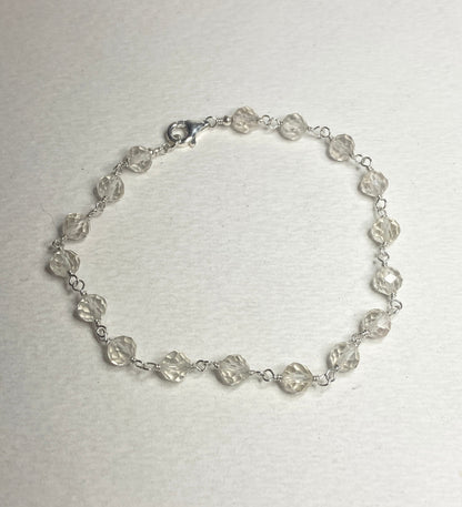 Sterling silver bracelet with faceted yellow Oregon sunstone beads.