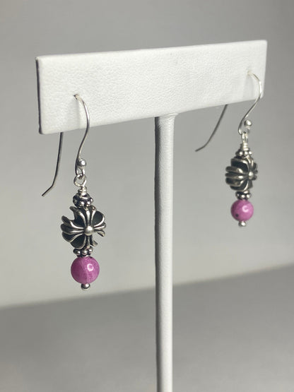 Sterling silver dangle earrings with pink sapphire corundum beads and cross charms.