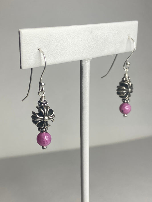 Sterling silver dangle earrings with pink sapphire corundum beads and cross charms.