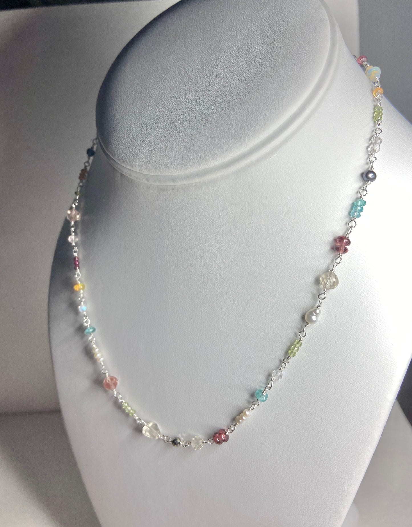 Sterling silver necklace with colorful natural gemstones and pearls.