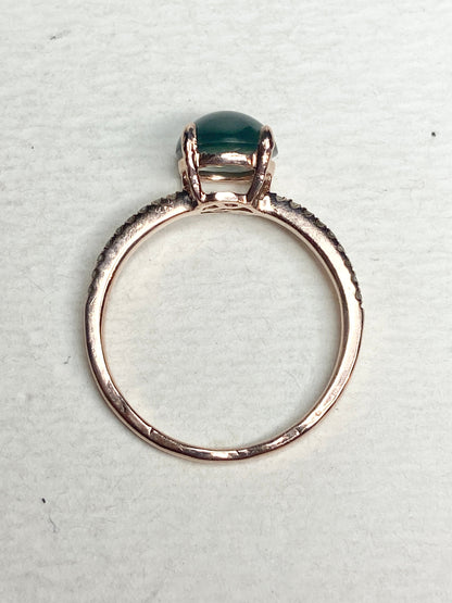 Untreated teal jadeite and diamond ring in 14k rose gold.