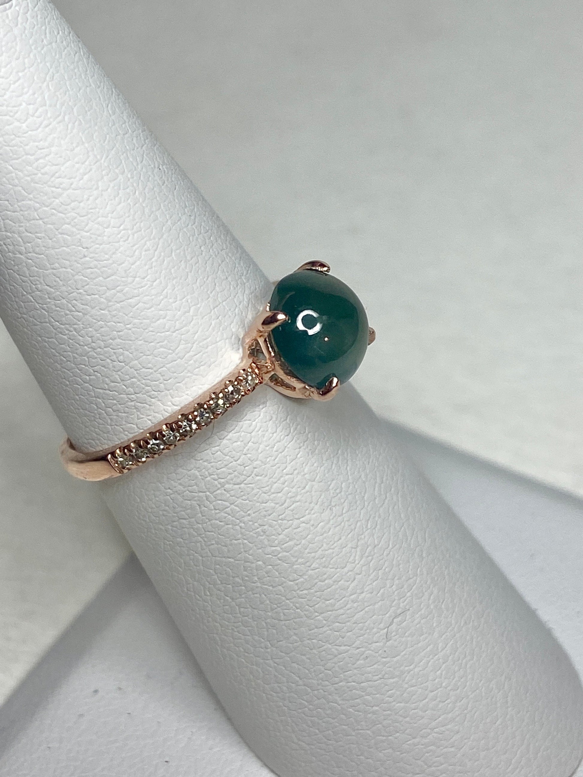 Untreated teal jadeite and diamond ring in 14k rose gold.