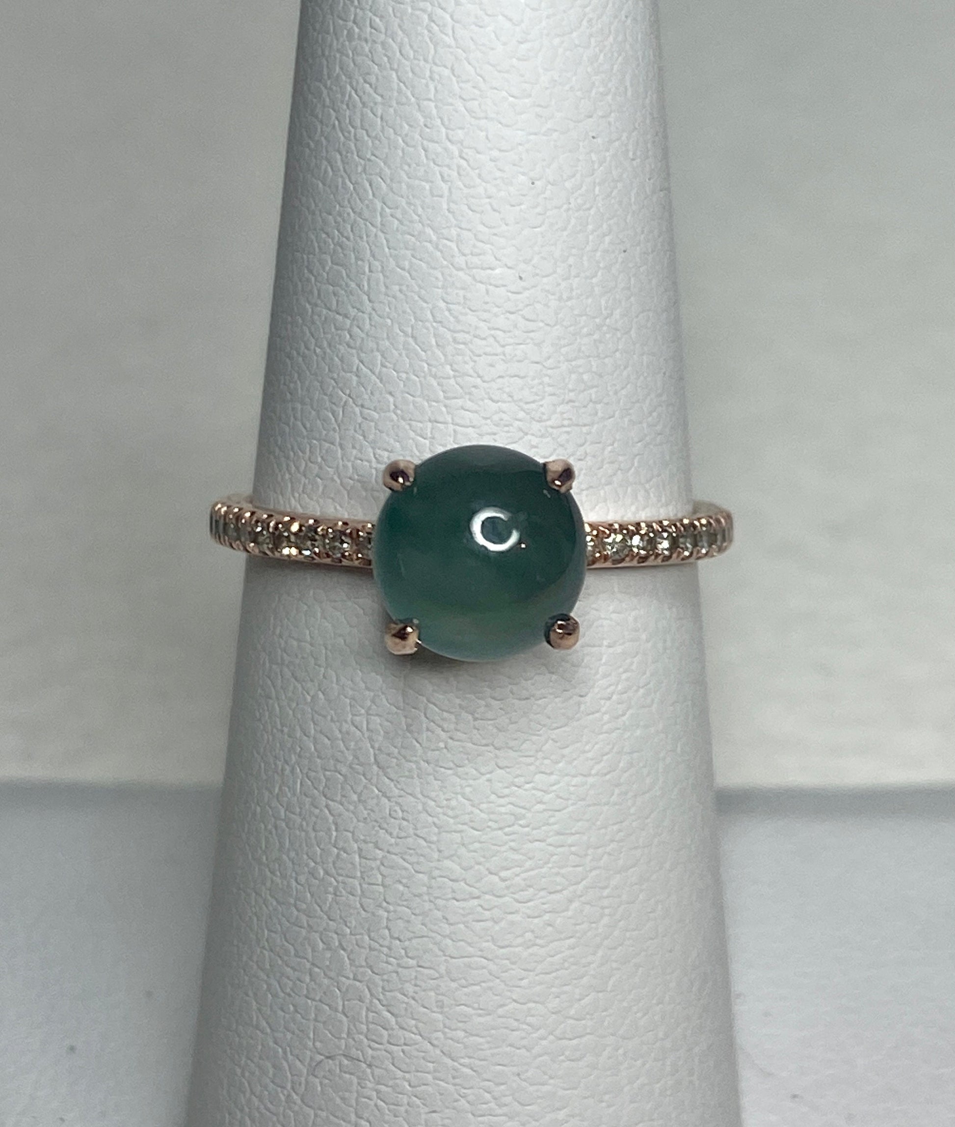 Untreated teal jadeite and diamond ring in 14k rose gold.