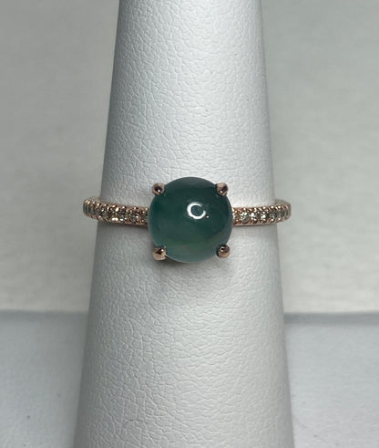 Untreated teal jadeite and diamond ring in 14k rose gold.