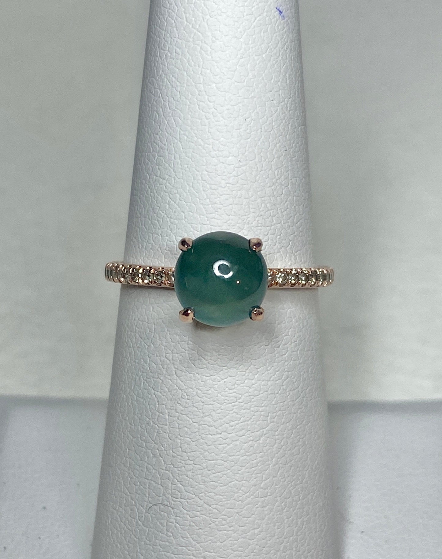 Untreated teal jadeite and diamond ring in 14k rose gold.