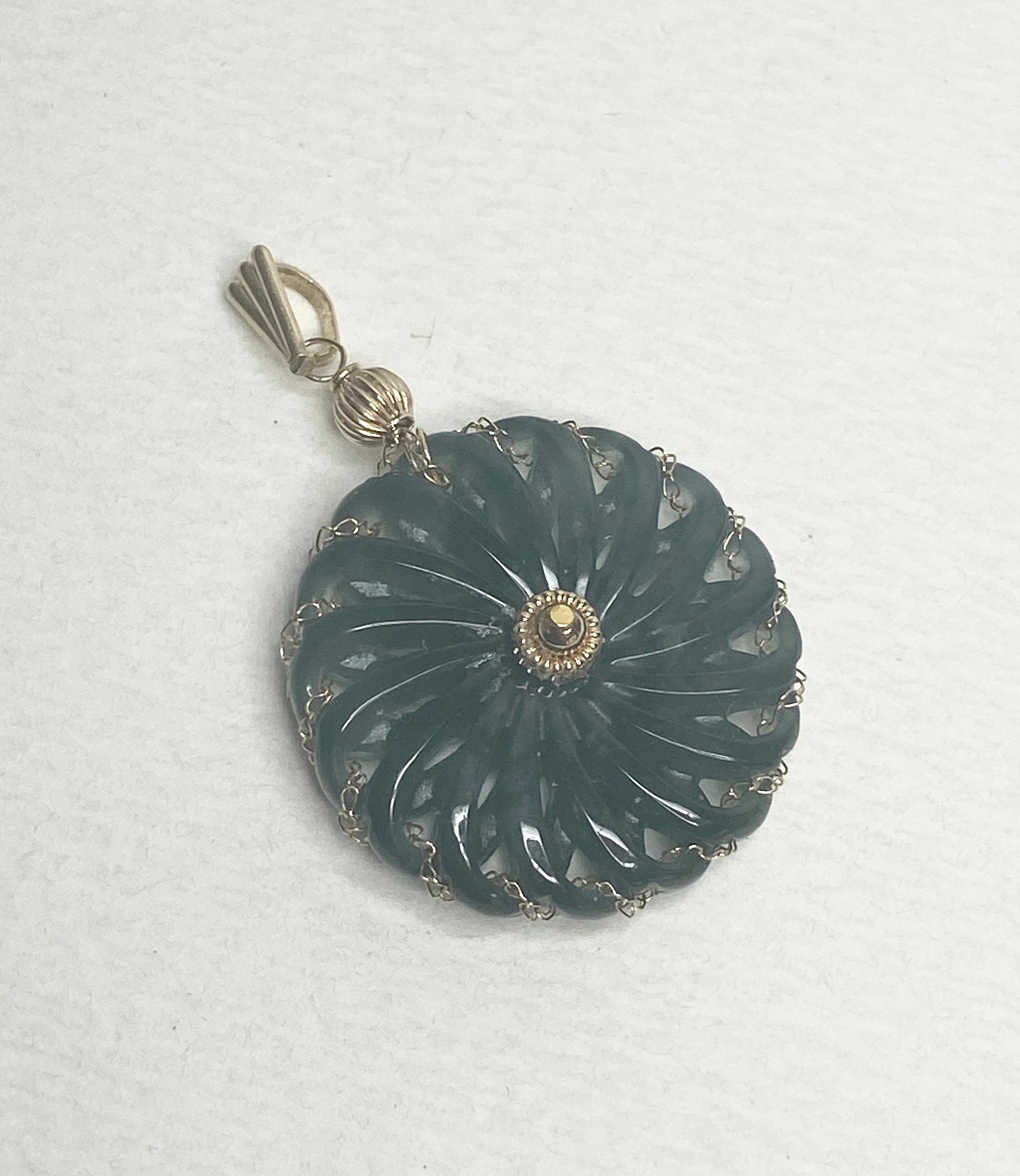 Guatemalan teal jadeite donut pendant with 14k gold bale.