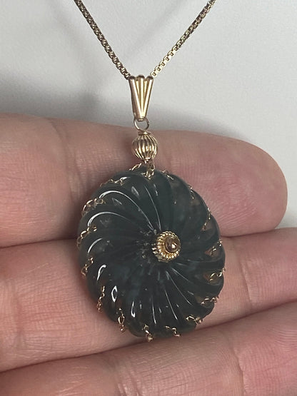 Guatemalan teal jadeite donut pendant with 14k gold bale.