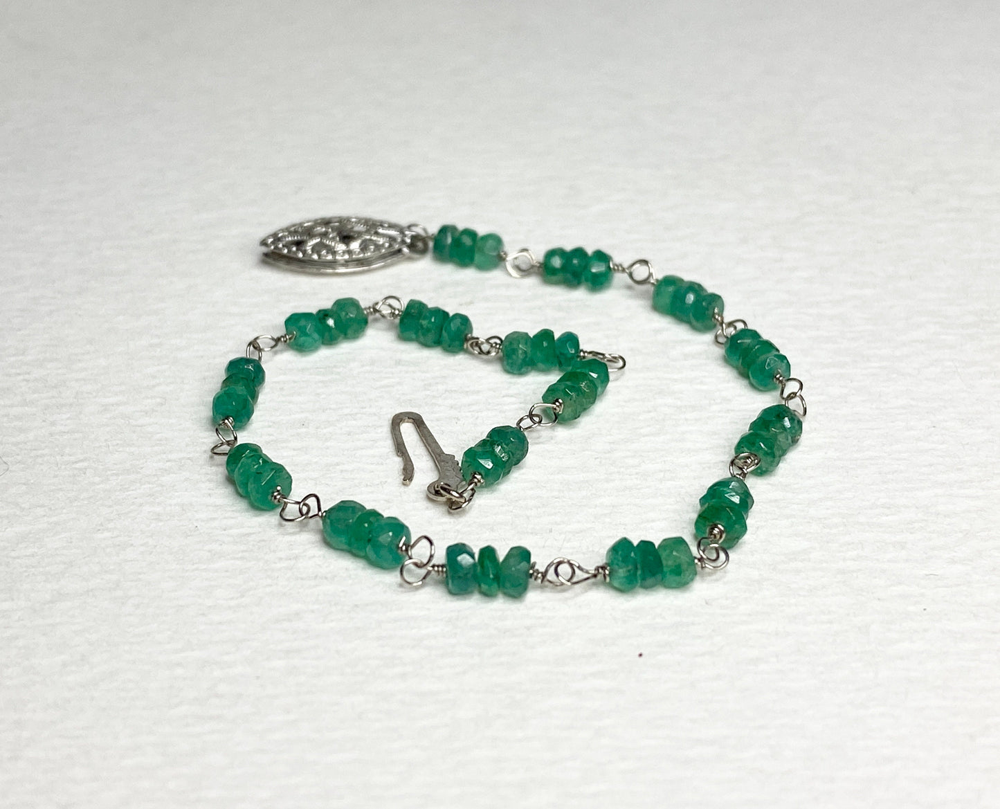 Natural emerald beaded bracelet with a white gold clasp.