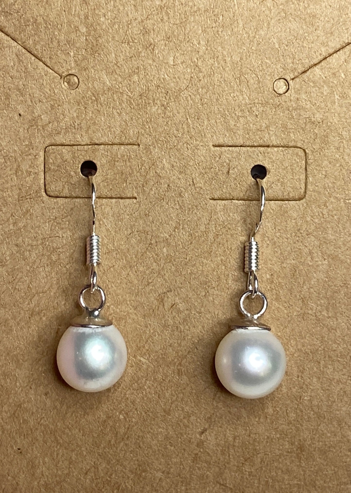 Sterling silver dangle earrings with 8mm white Edison pearls.
