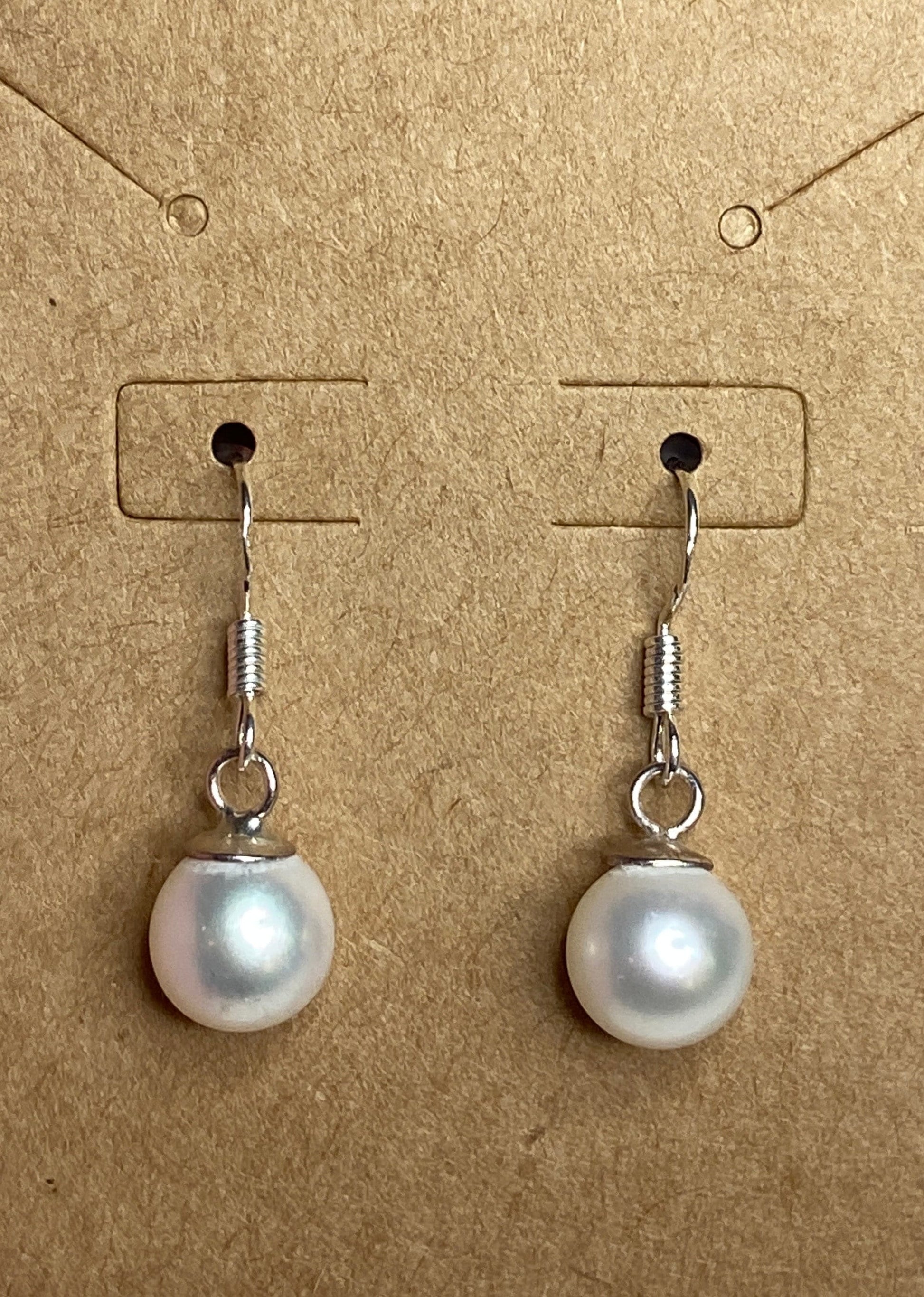 Sterling silver dangle earrings with 8mm white Edison pearls.
