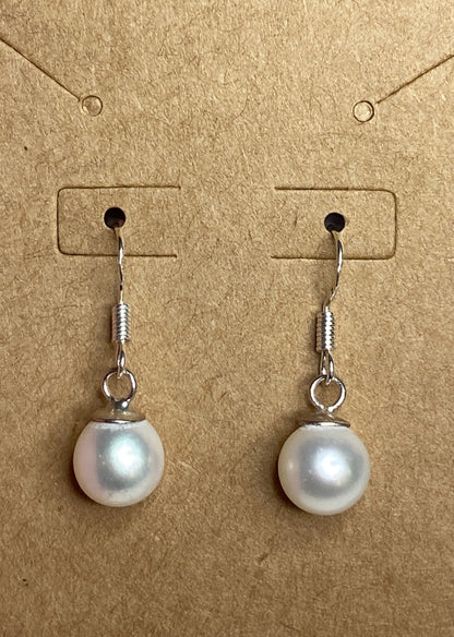 Sterling silver dangle earrings with 8mm white Edison pearls.