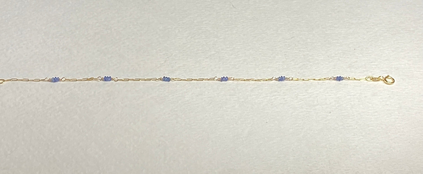 14k gold paperclip chain bracelet with untreated violet-blue Burmese sapphire beads.