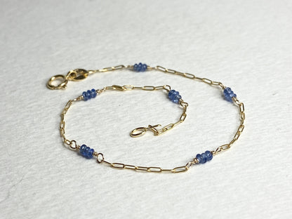 14k gold paperclip chain bracelet with untreated violet-blue Burmese sapphire beads.