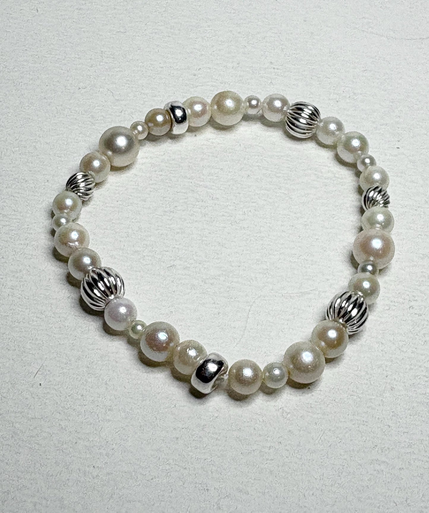 Vintage Akoya pearl stretch bracelet with sterling silver accents.