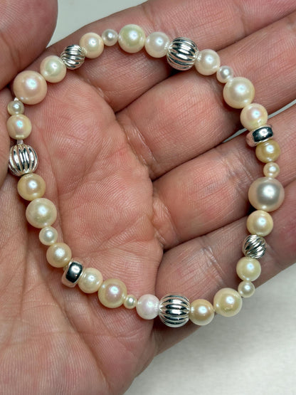Vintage Akoya cultured pearl stretch bracelet with sterling silver beads.