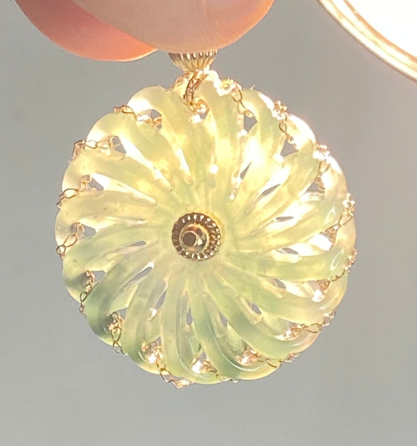 Omlec Guatemalan teal jadeite donut pendant in solid 14k gold.