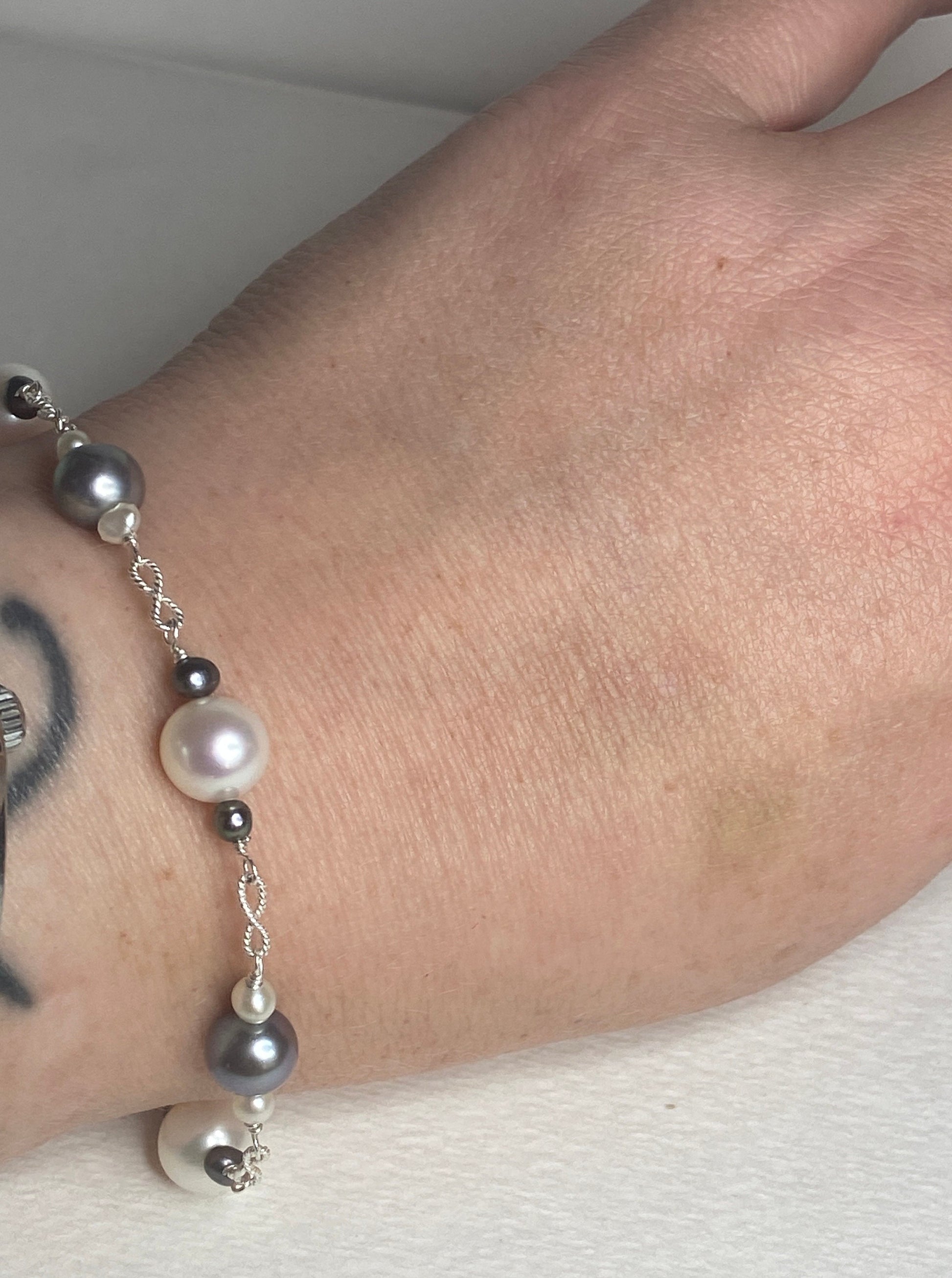 Sterling silver bracelet with Akoya, Tahitian, and freshwater pearls.