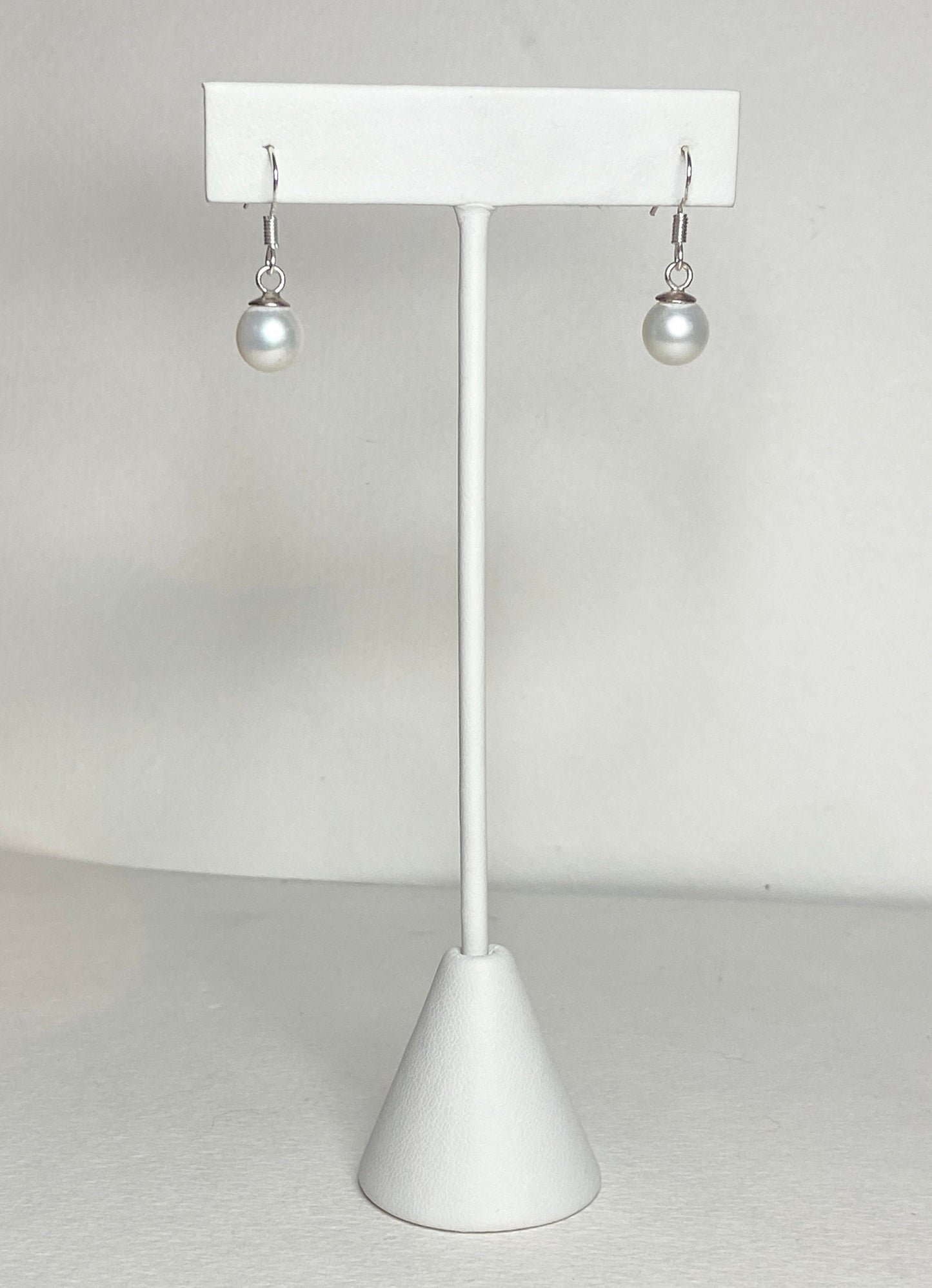 Sterling silver dangle earrings with 8mm white Edison pearls.