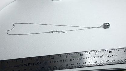 Tahitian pearl daisy pendant necklace on an adjustable chain.