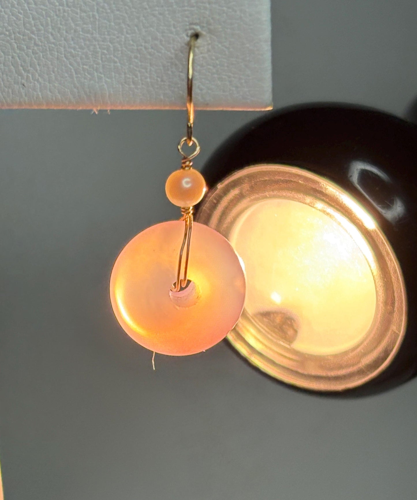 14k gold dangle earrings with pink ombre agate donuts and akoya pearls.