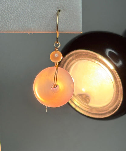 14k gold dangle earrings with pink ombre agate donuts and akoya pearls.