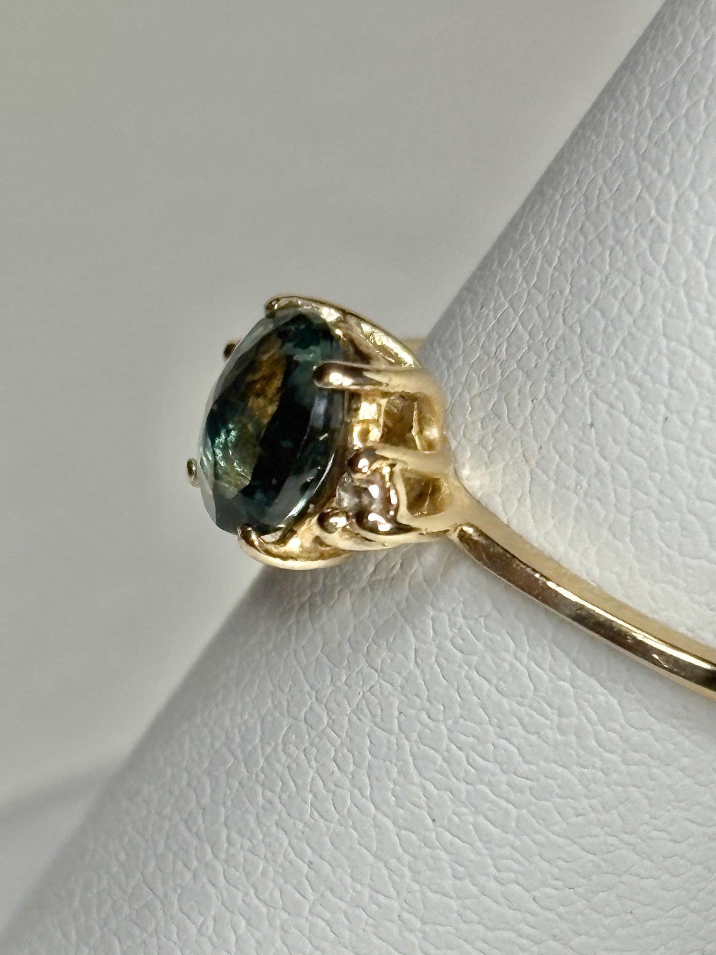 Montana sapphire and diamond ring in solid 14k yellow gold.
