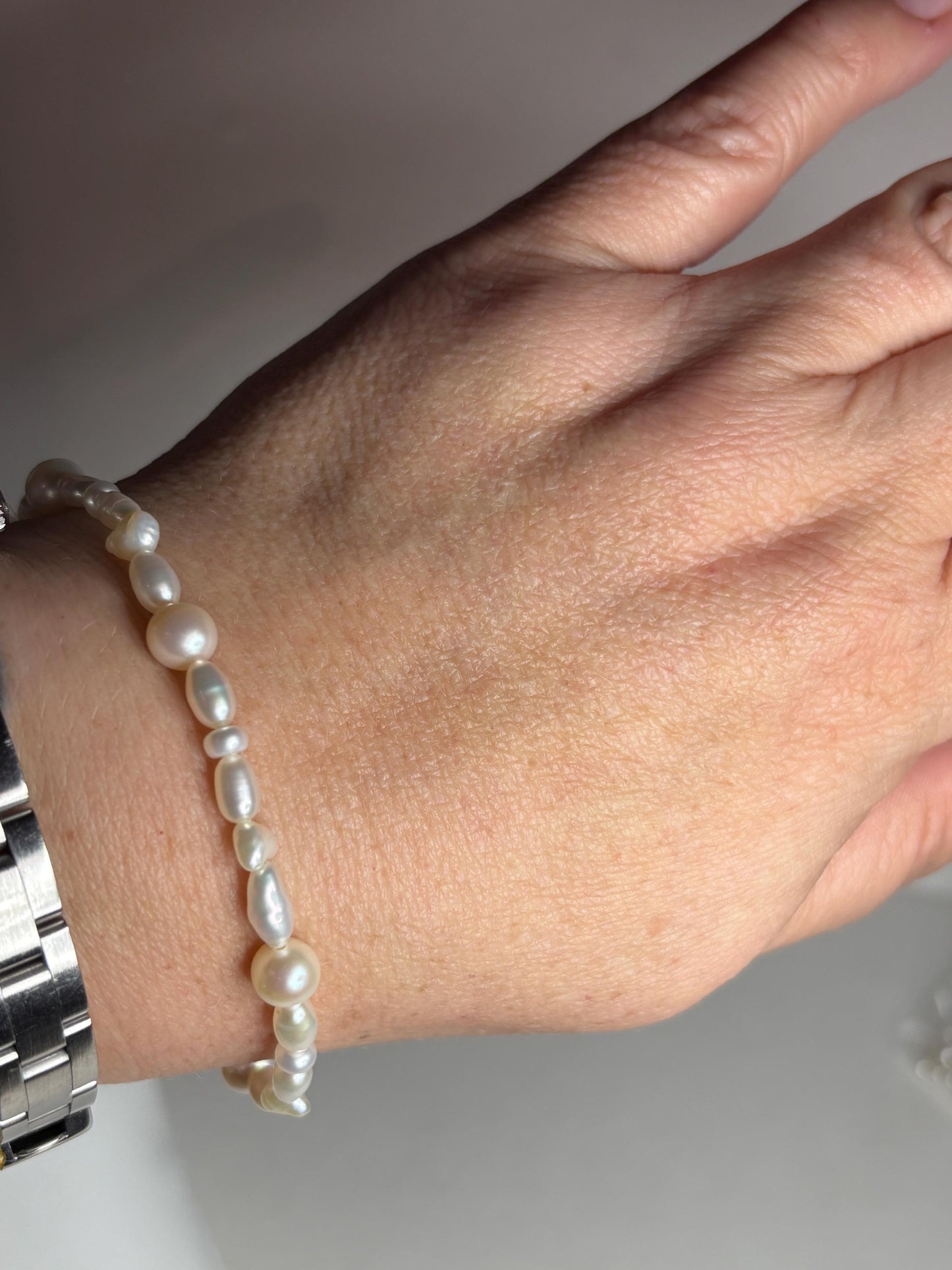 Freshwater cultured pearl rice and baroque stretch bracelet.