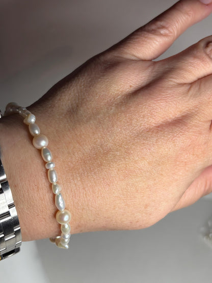 Freshwater cultured pearl rice and baroque stretch bracelet.