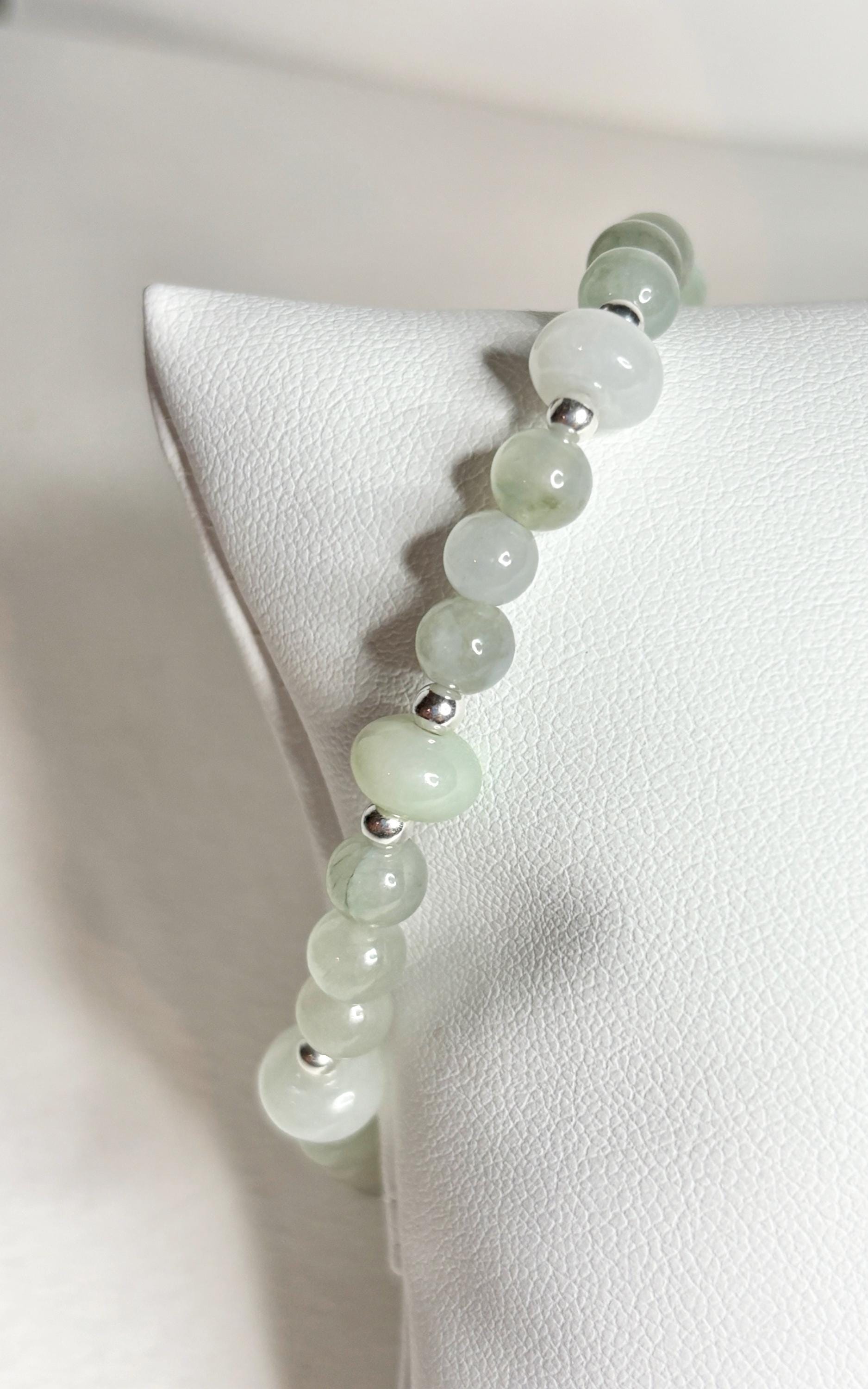 Natural Type A Icy Burmese Jadeite Jade Sterling Silver Stretch Bracelet with light green and white beads.