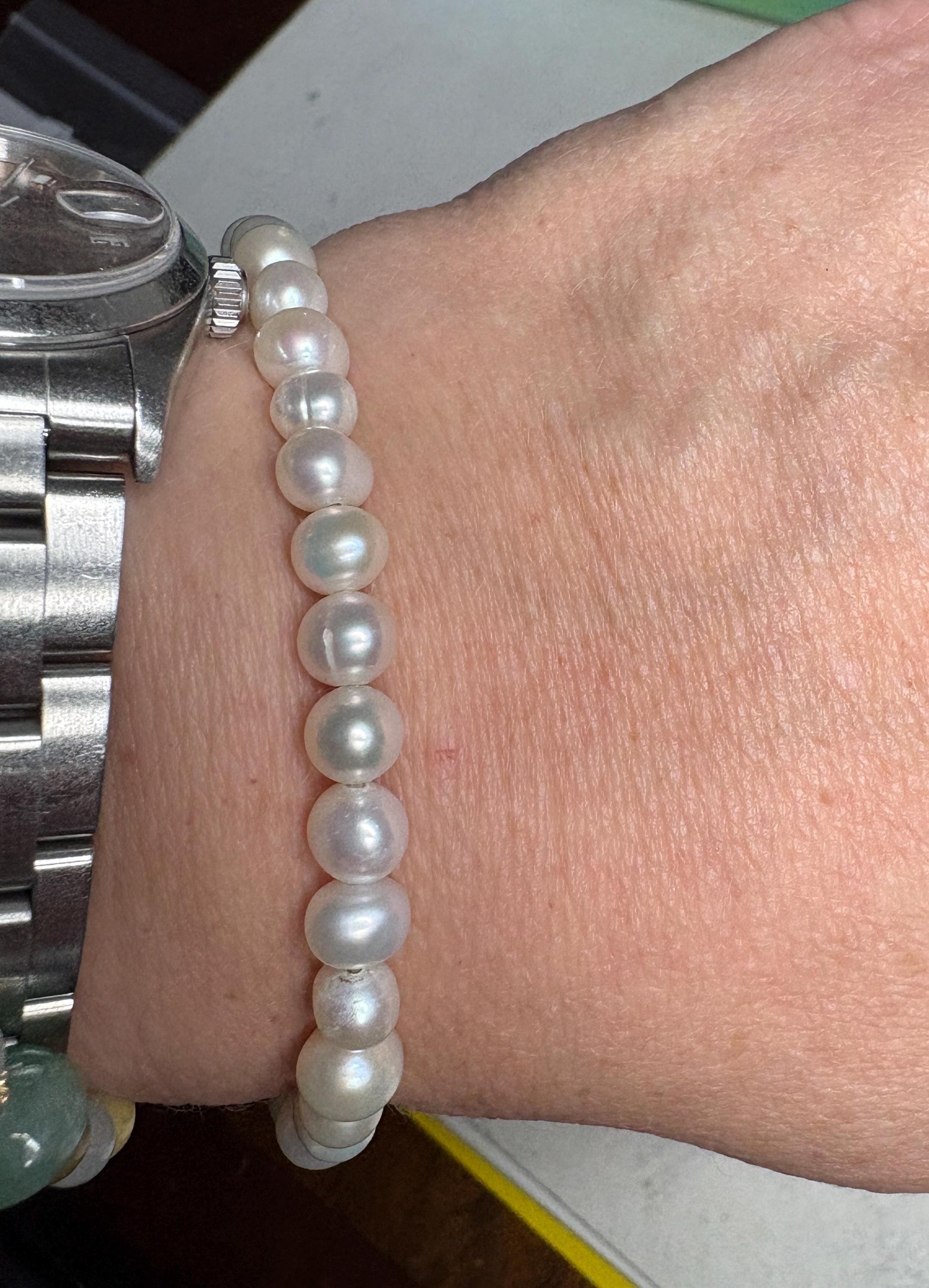 Freshwater cultured pearl stretch bracelet with baroque and potato-shaped pearls.