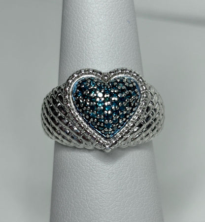 Sterling silver heart ring with pave blue diamonds.