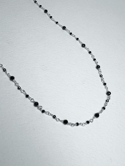 Sterling silver necklace with black diamond beads.