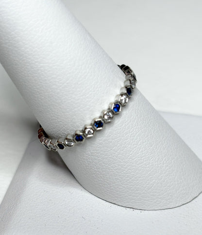 Sapphire and diamond honeycomb hexagon semi-eternity band ring in 14k white gold.