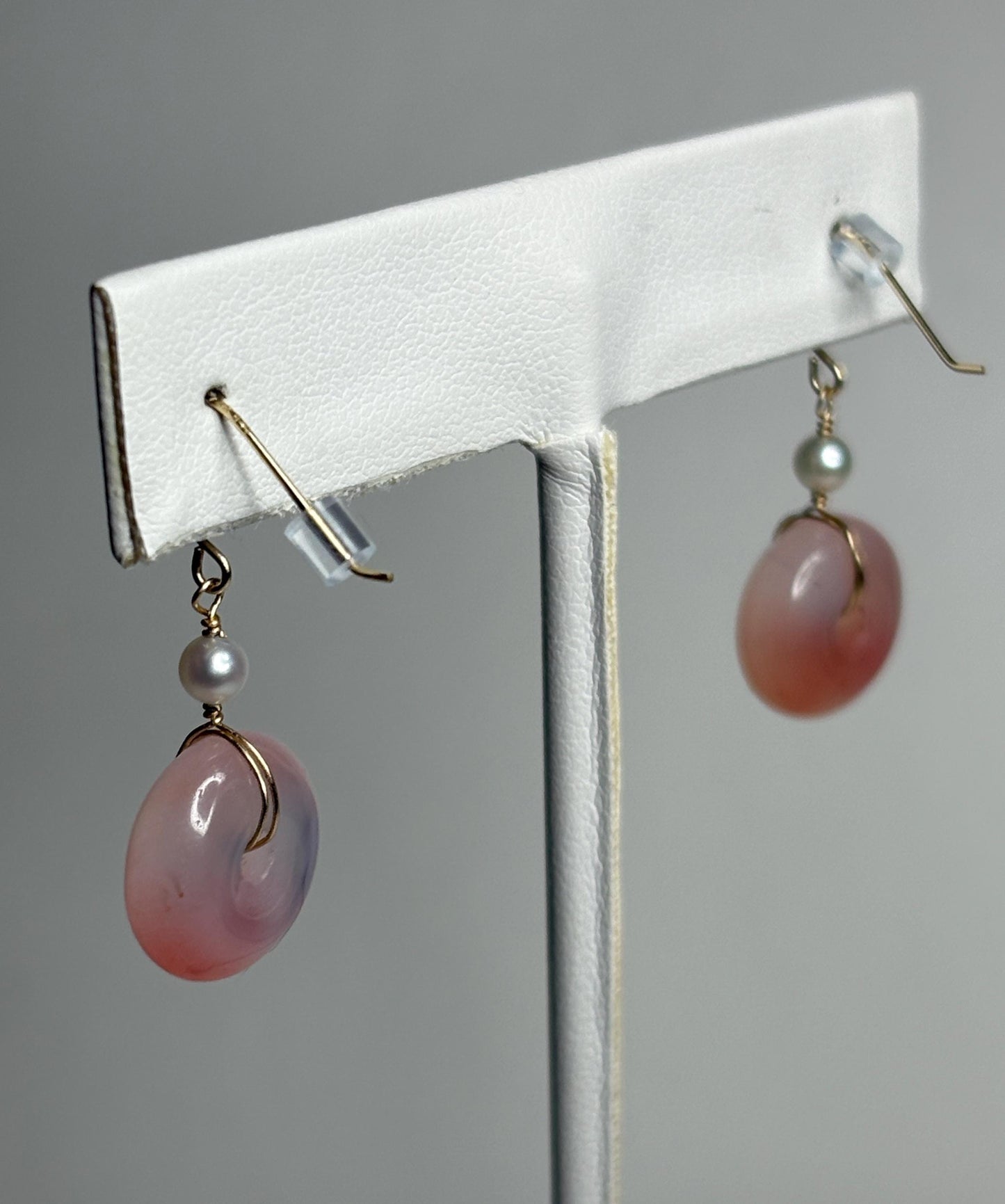 14k gold dangle earrings with pink ombre agate donuts and akoya pearls.