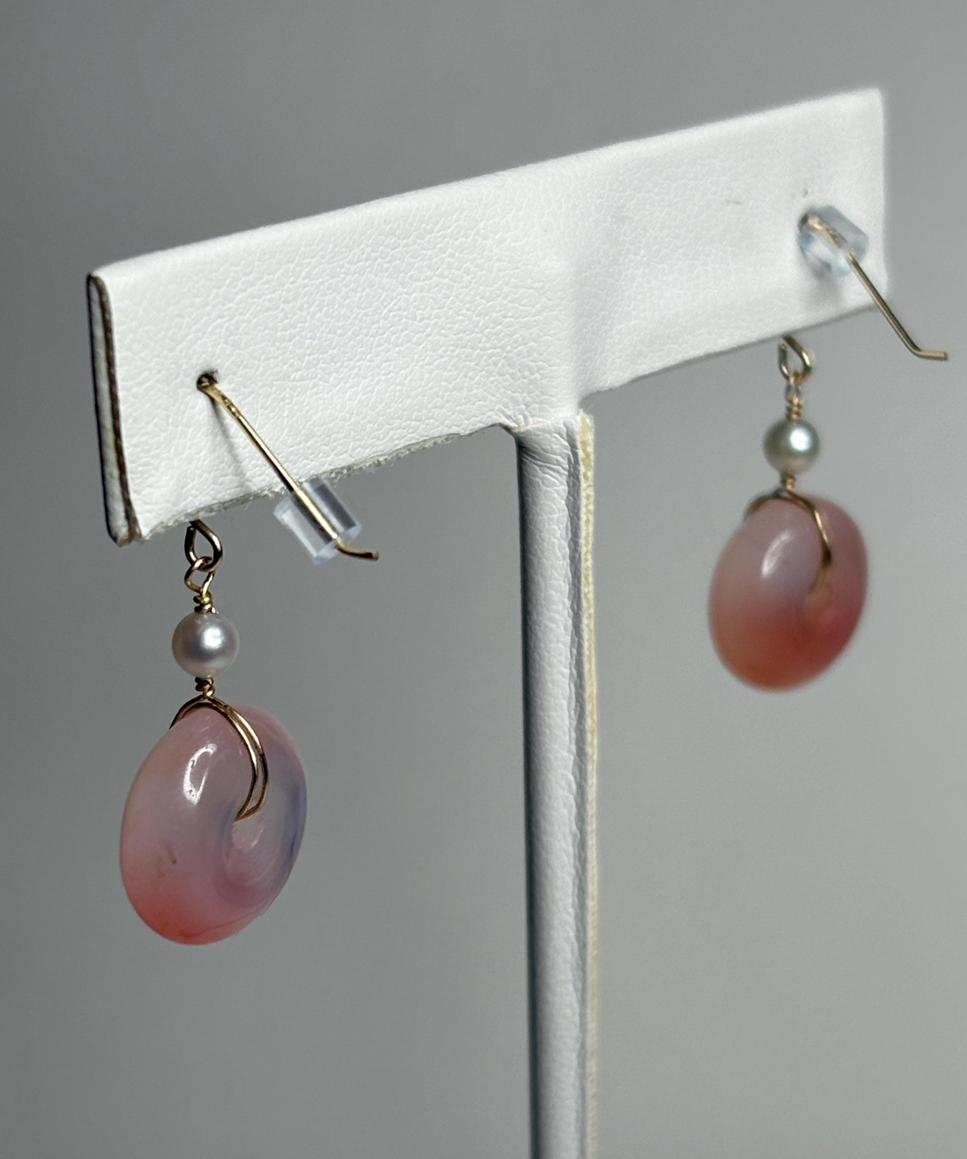 14k gold dangle earrings with pink ombre agate donuts and akoya pearls.
