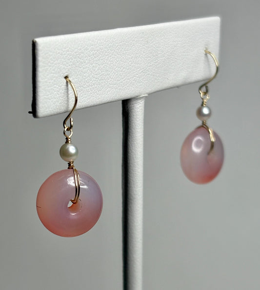 14k gold dangle earrings with pink ombre agate donuts and Akoya pearls.
