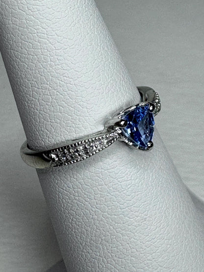 Tanzanite trillion heart ring with diamonds in 10k white gold.