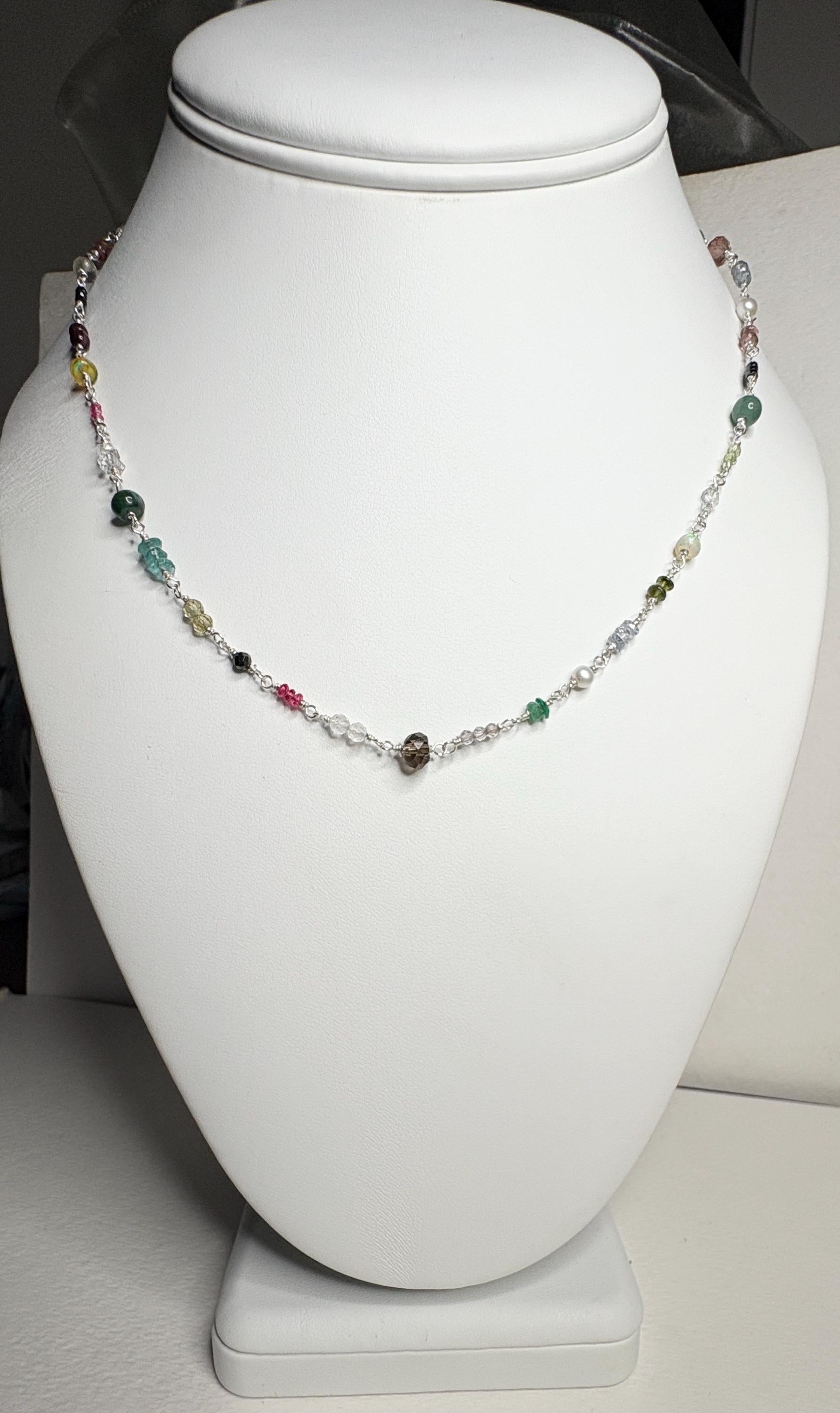 Sterling silver necklace with colorful natural gemstones.