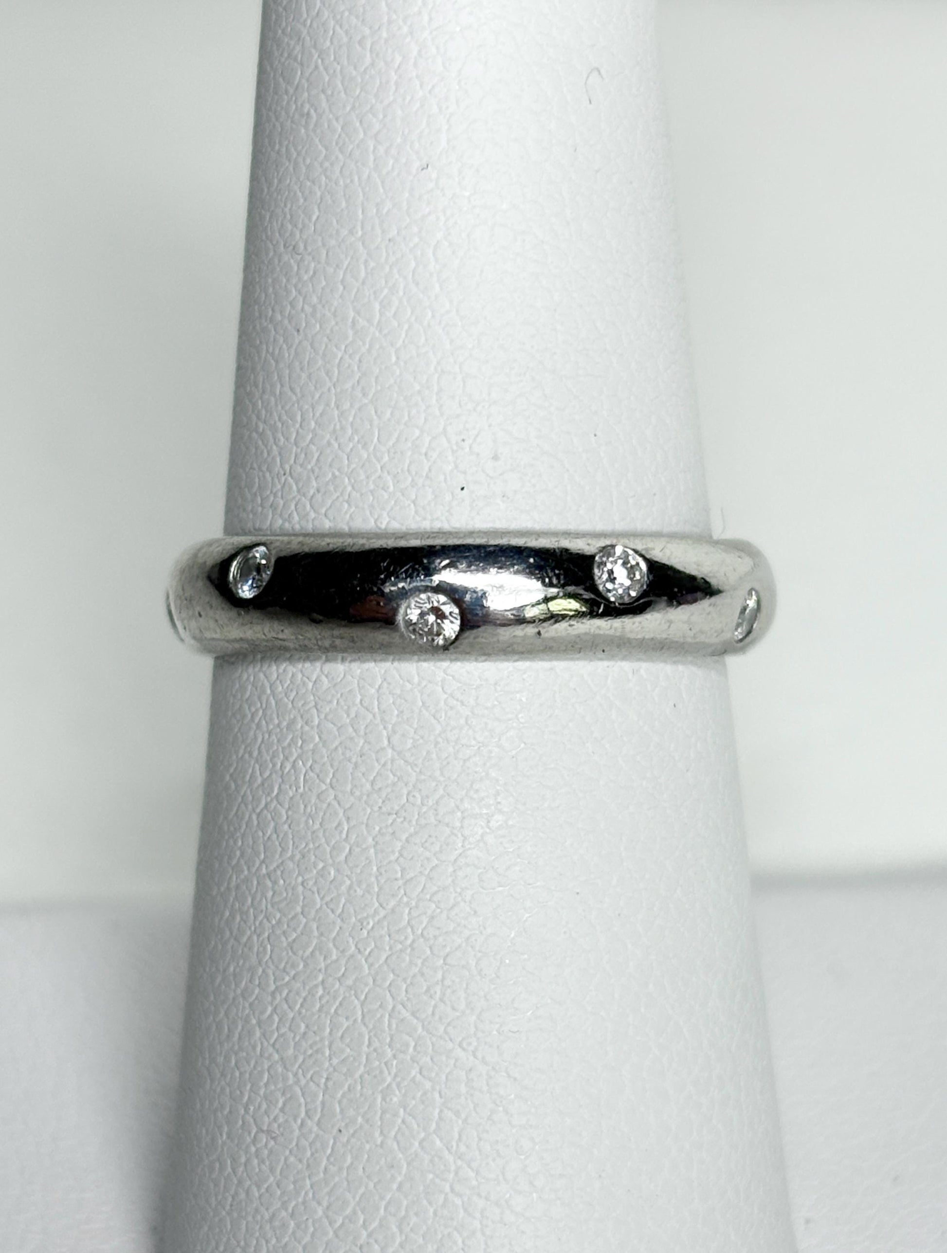 Tiffany & Co. platinum eternity band ring with diamonds.