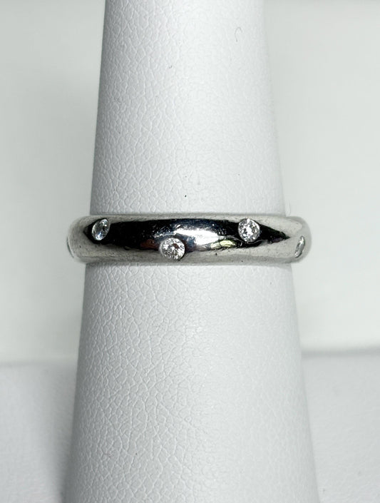 Tiffany & Co. platinum eternity band ring with diamonds.