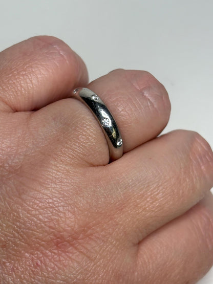 Tiffany & Co. platinum eternity band ring with diamonds.