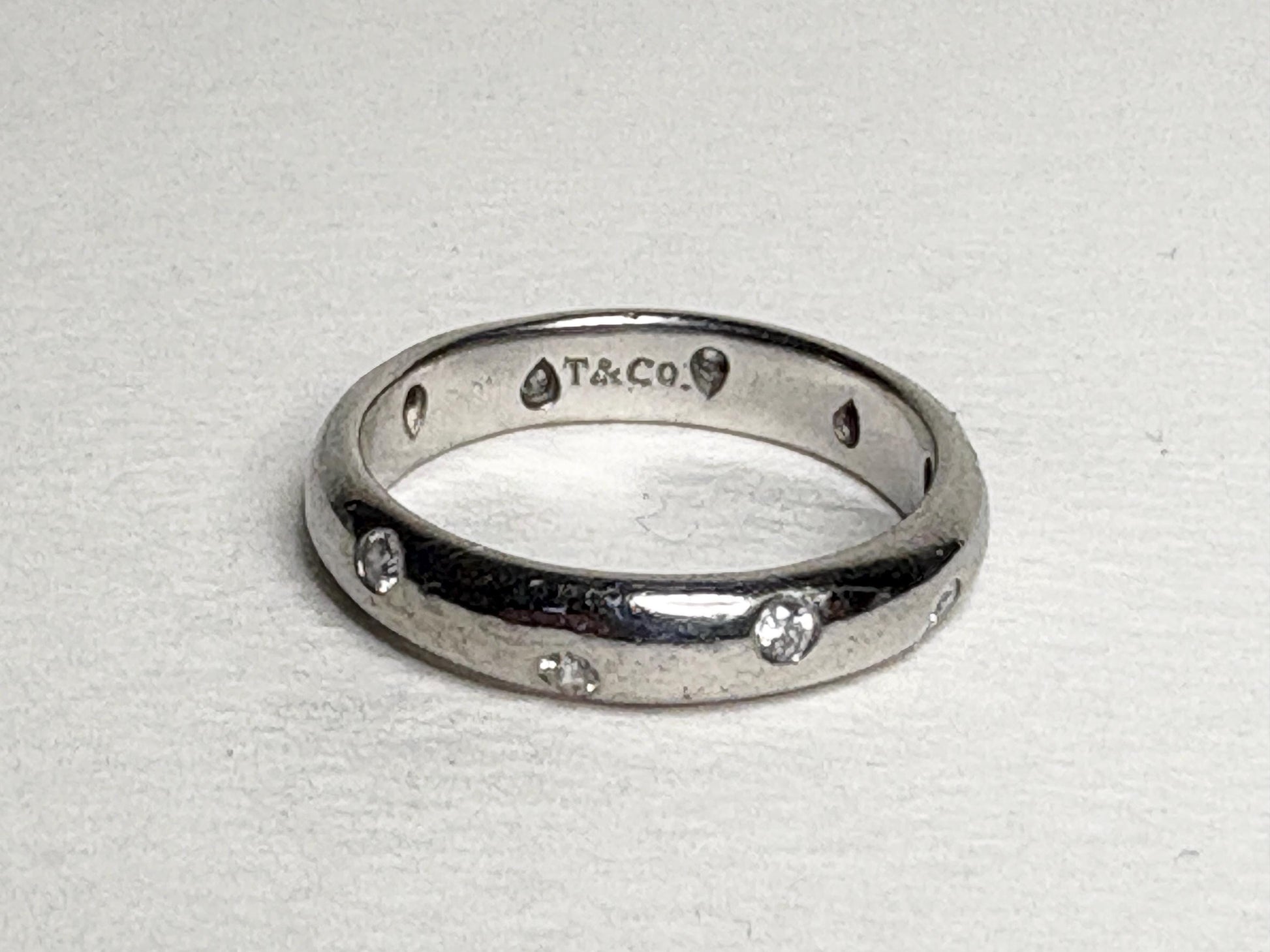 Tiffany & Co. platinum eternity band ring with diamonds.