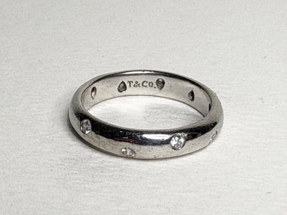 Tiffany & Co. platinum eternity band ring with diamonds.