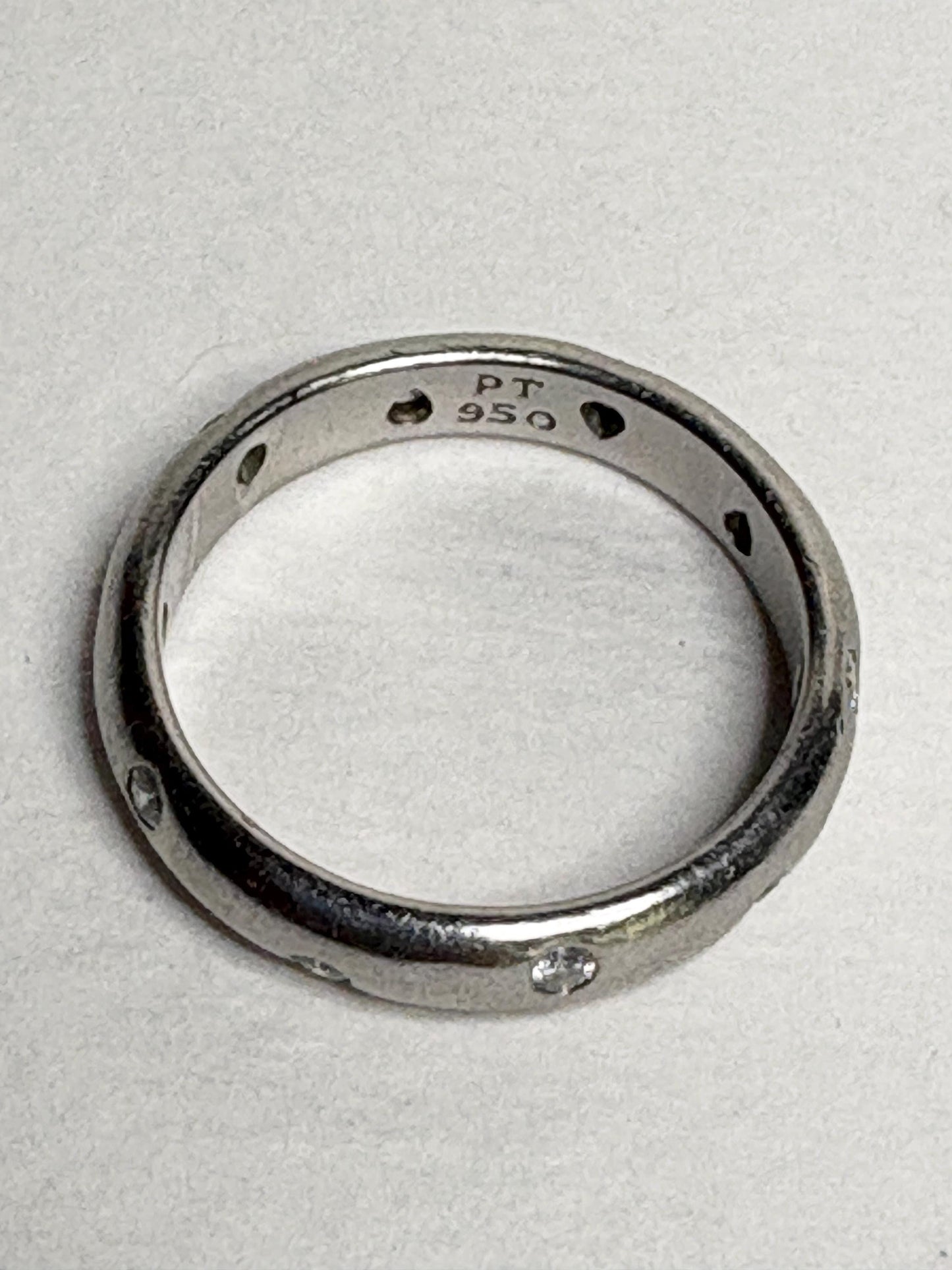 Tiffany & Co. platinum eternity band ring with diamonds.