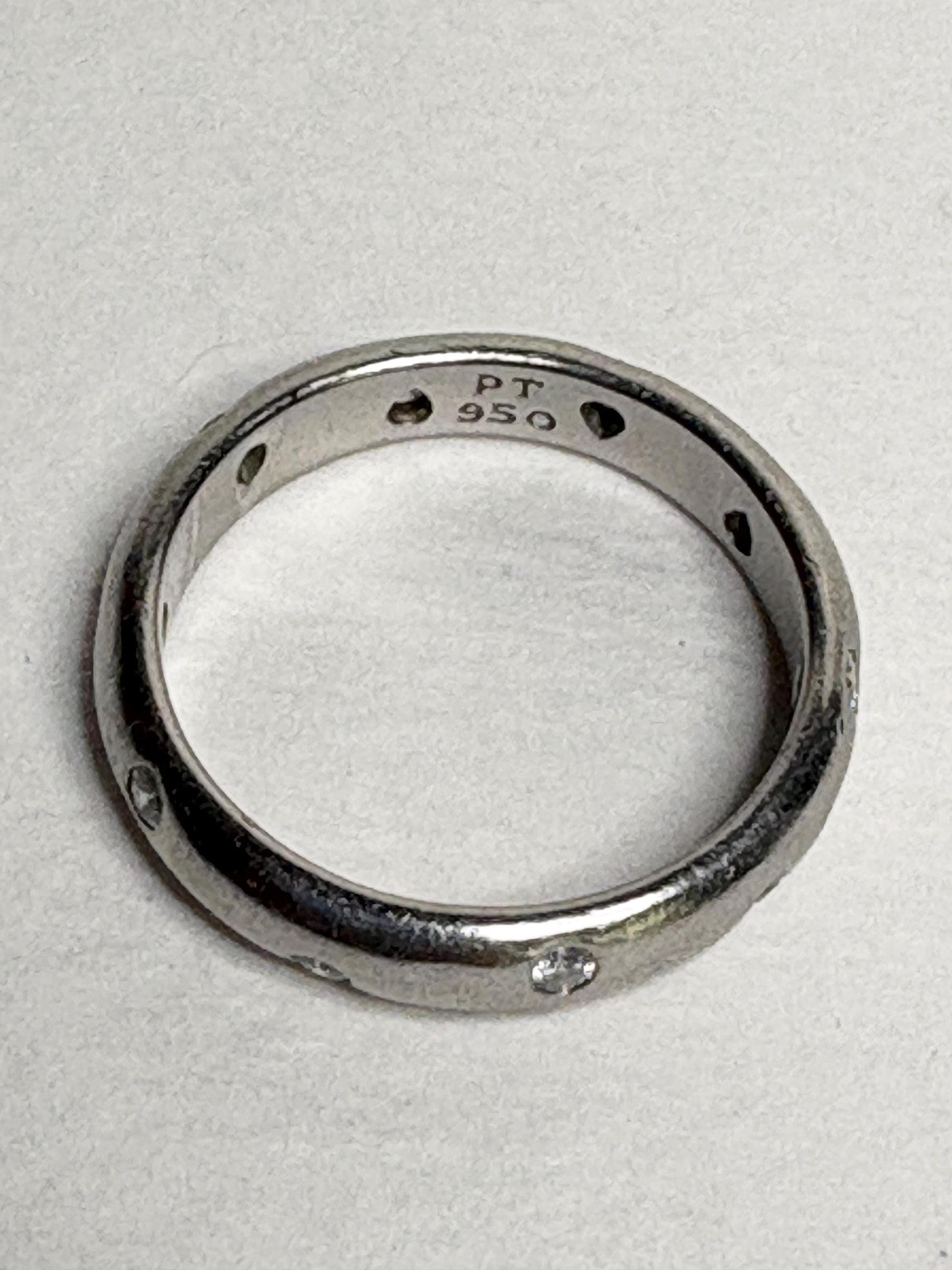 Tiffany & Co. platinum eternity band ring with diamonds.